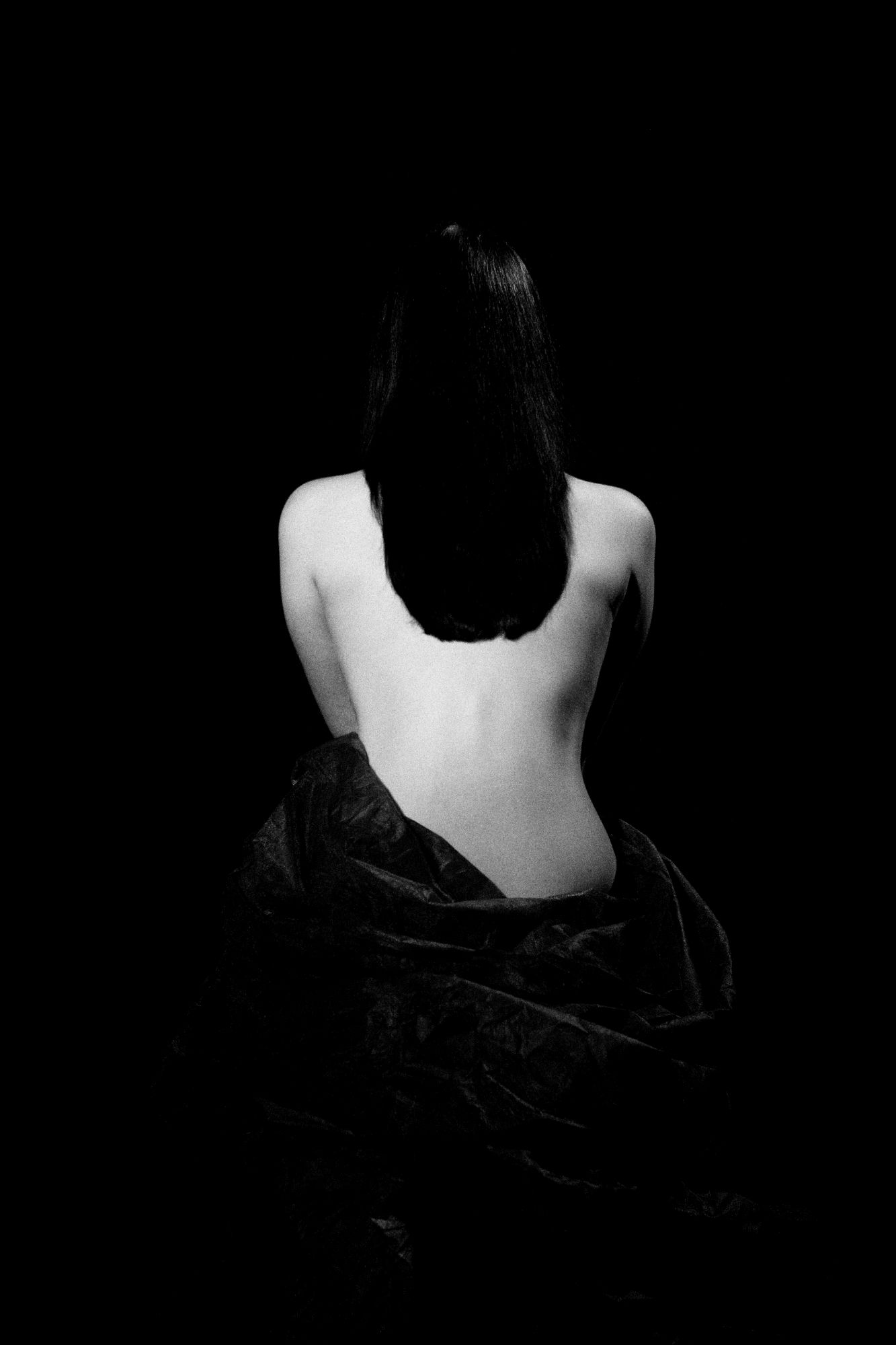 Black and white photo of woman torso
