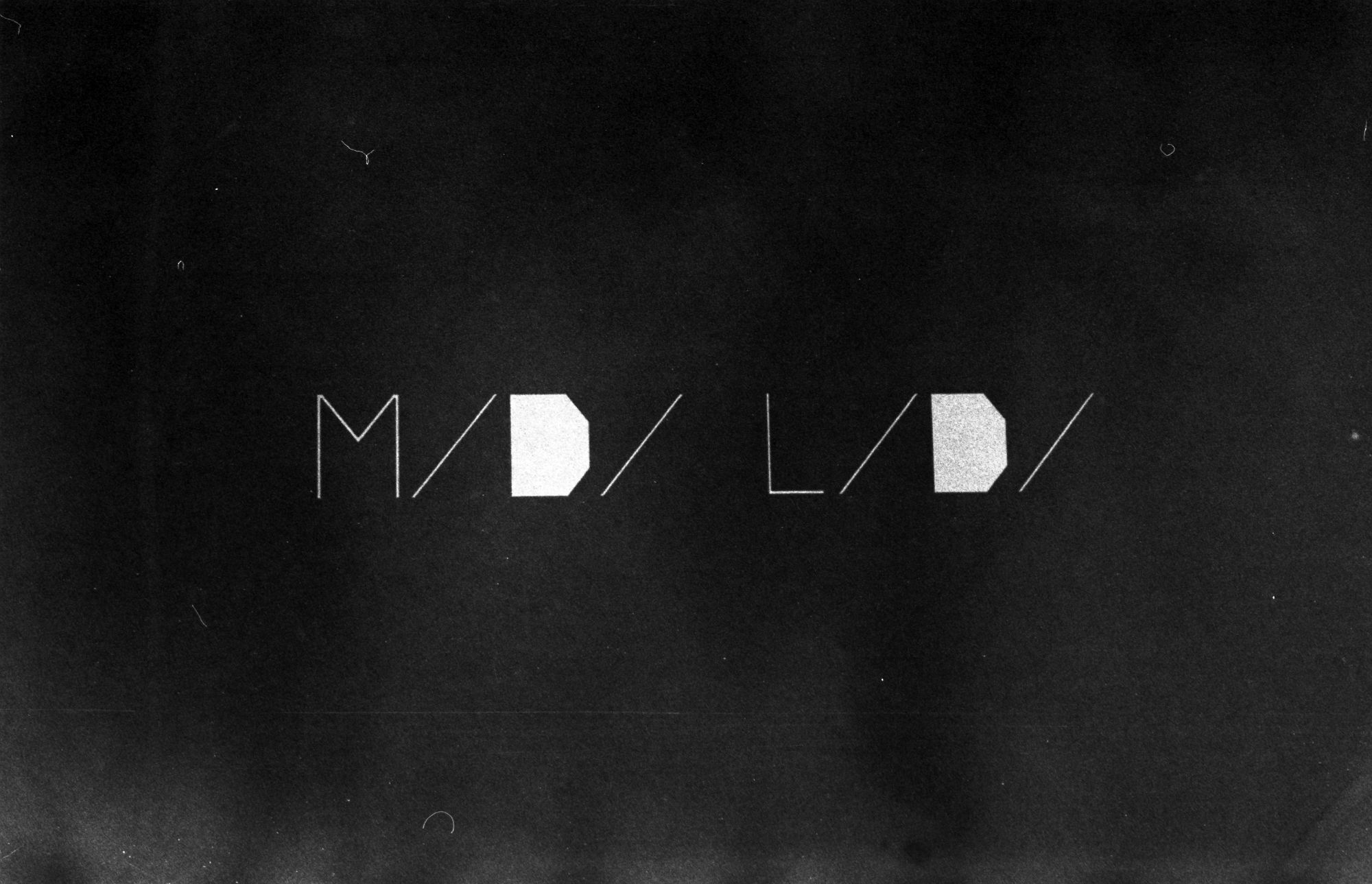 Black and white photo of Midi LIdi logo