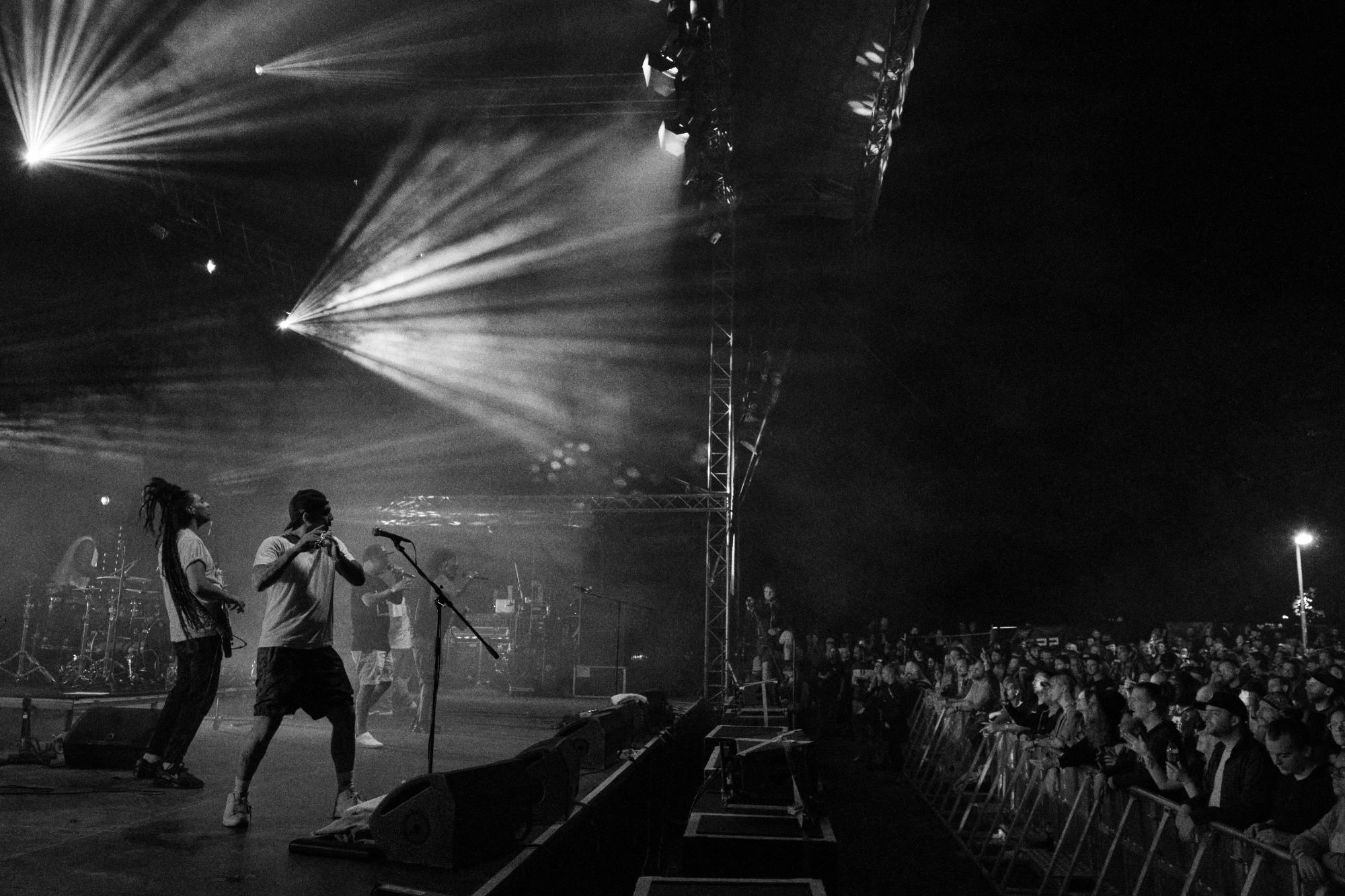 Black and white photo of Asian dub Foundation performing at Rock for Churchill