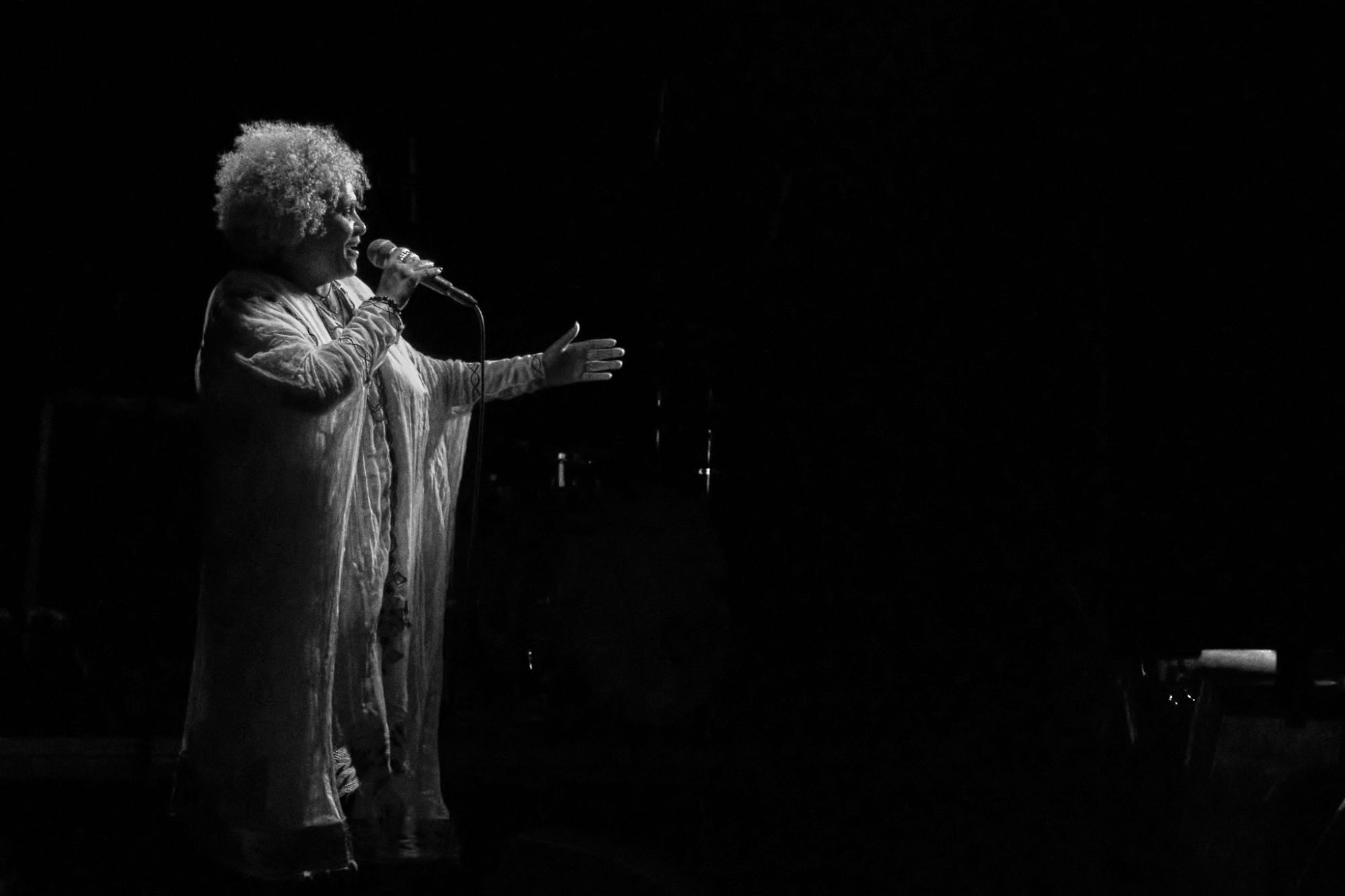 Black and white photo of ETENESH WASSIE performing at Meet Factory in Prague