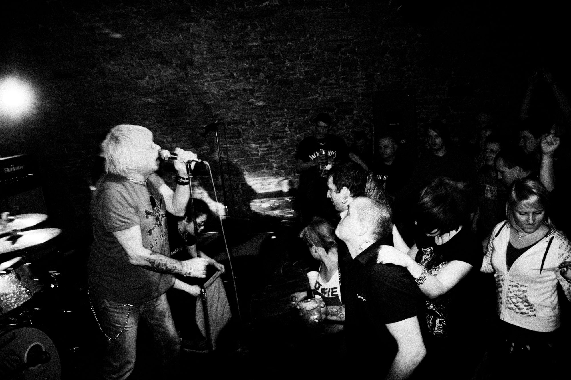 Black and white photo of UK Subs & TV Smith concert in Valasske Mezirici