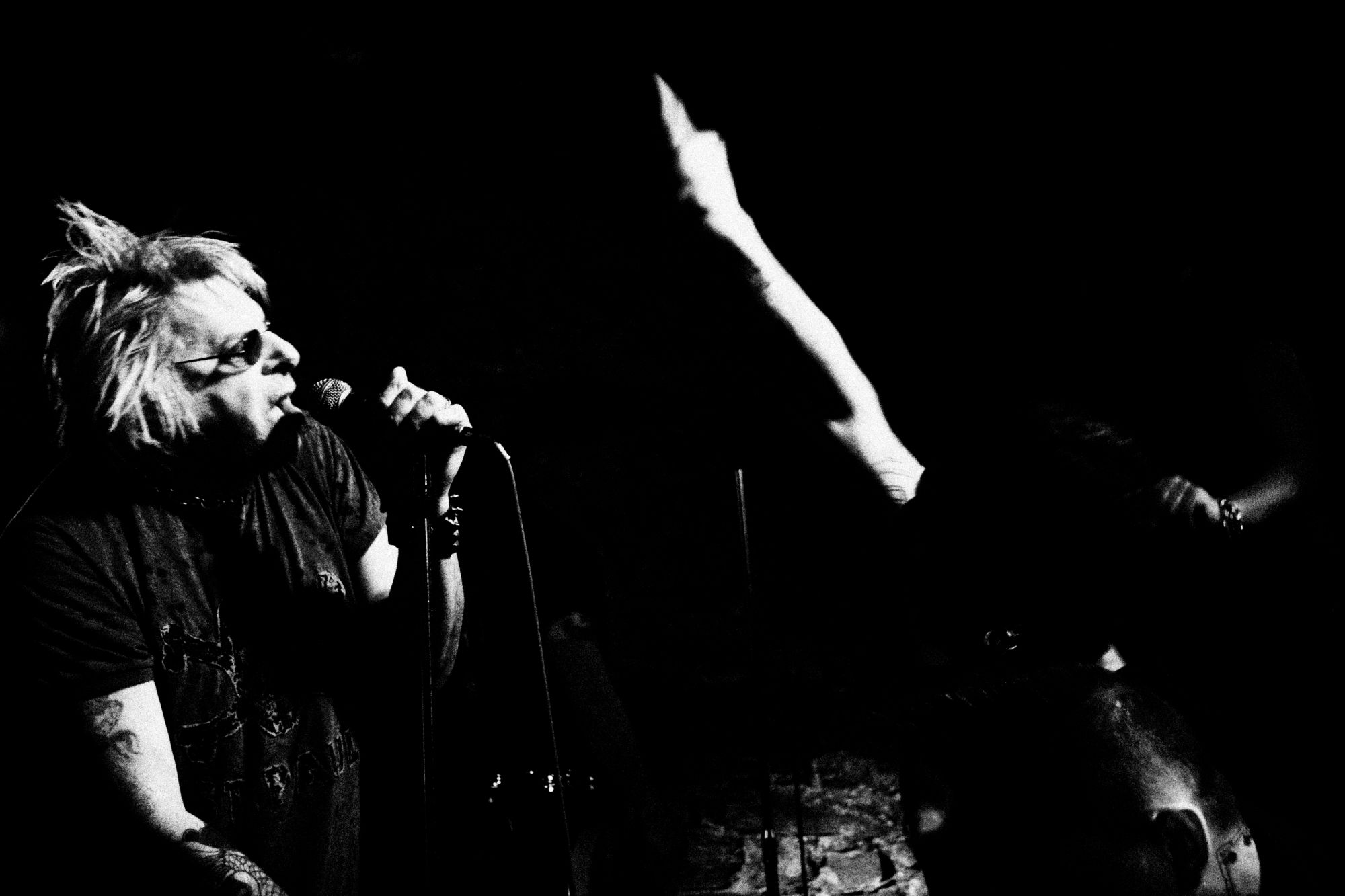 Black and white photo of UK Subs & TV Smith concert in Valasske Mezirici