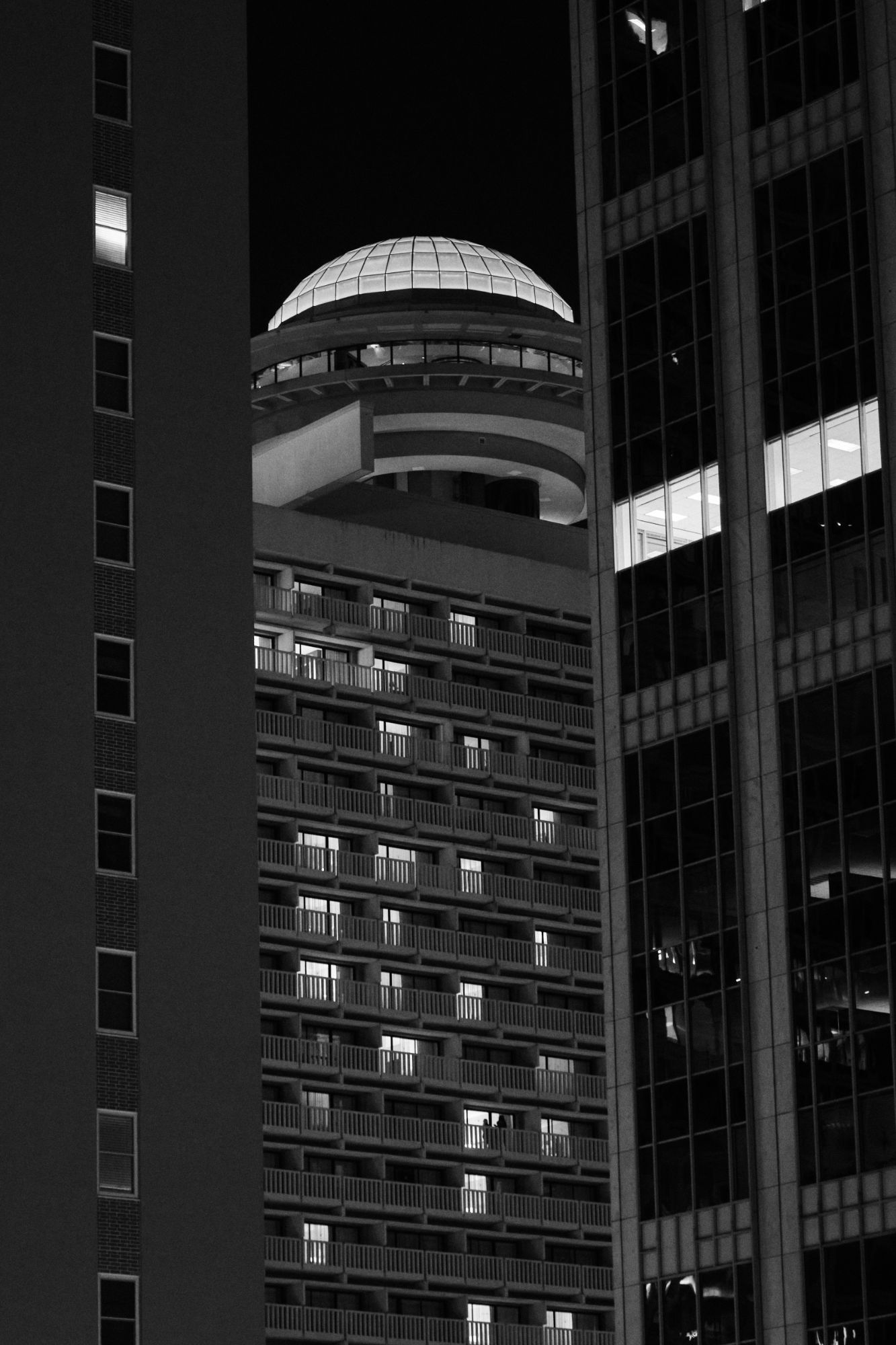 Black and white night photo of buildings in Atlanta