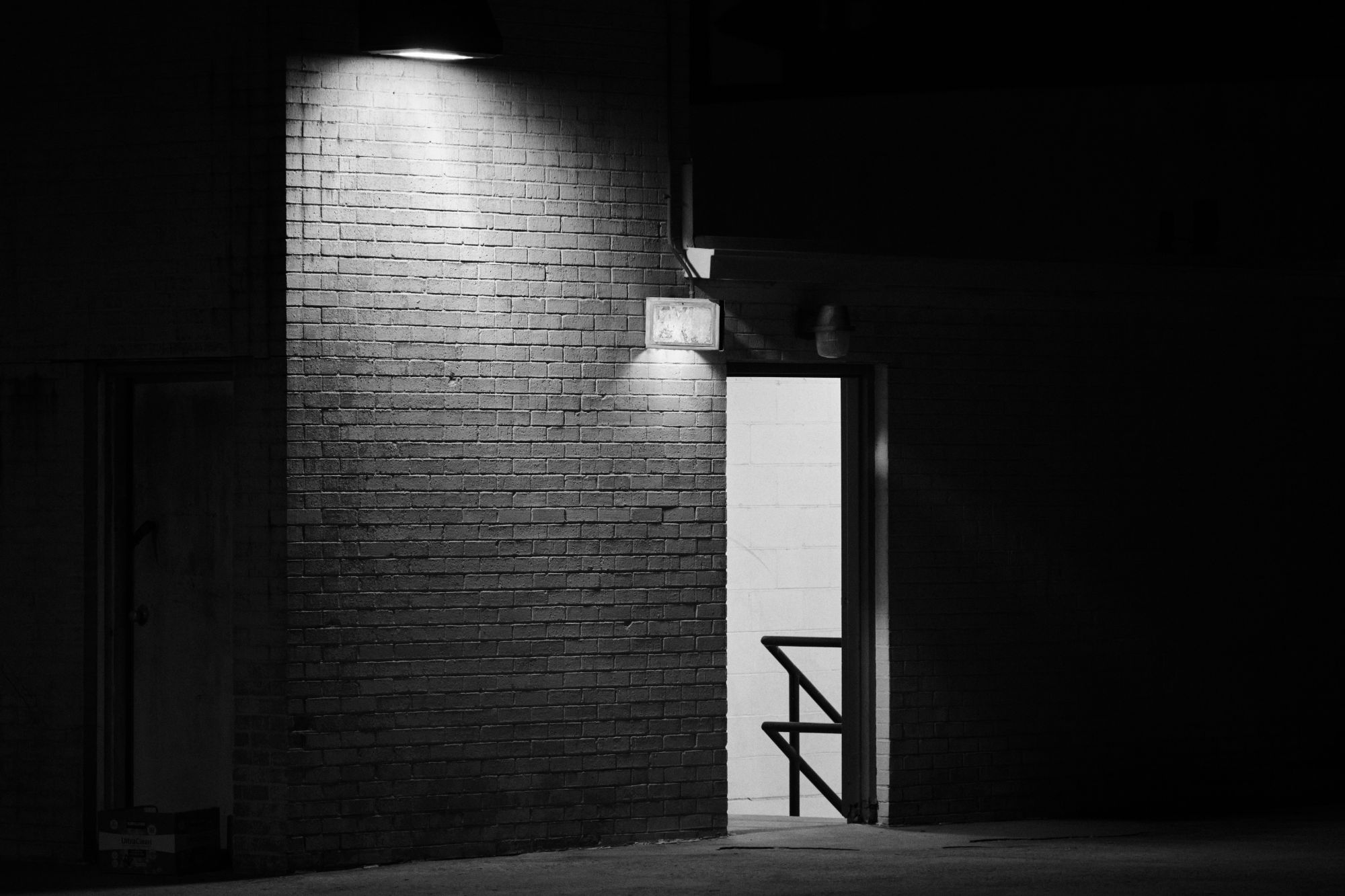 Black and white night Photo of open doors in Atlanta