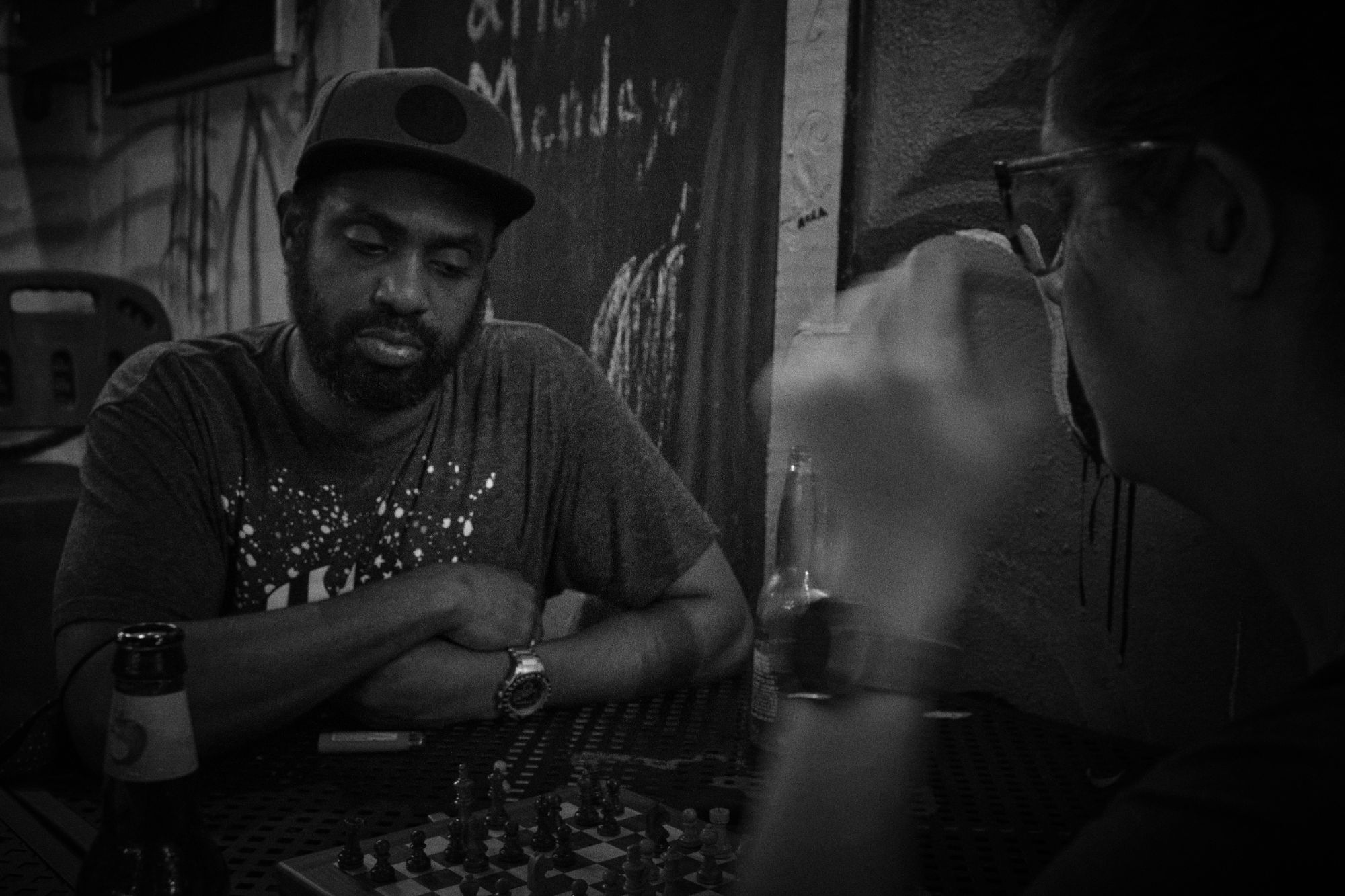 Black and white photo of two chess players in New Orleans
